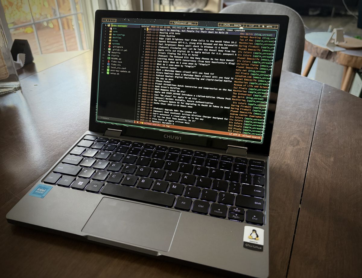 A tiny laptop with emacs opened.