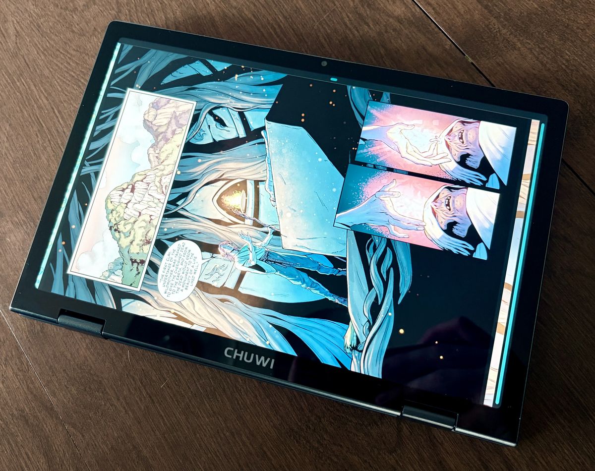 The Minibook with only the screen visible, displaying a comic.