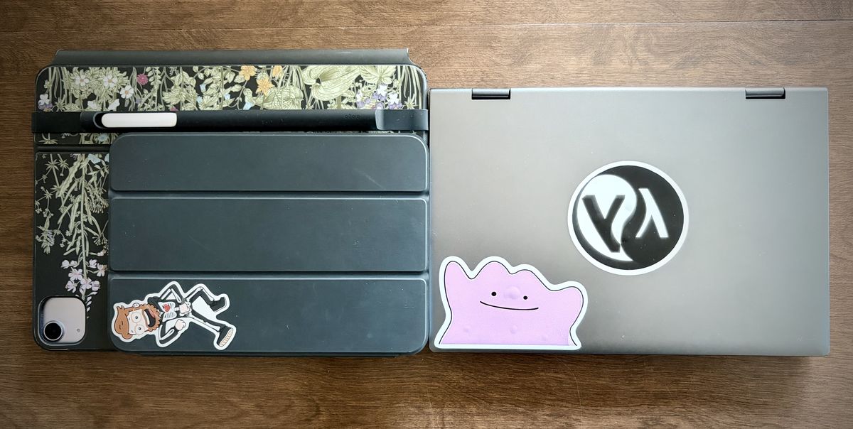 An iPad Air + magic keyboard case, with an iPad mini on top (left), and the Chuwi Minibook X next to it (right.)