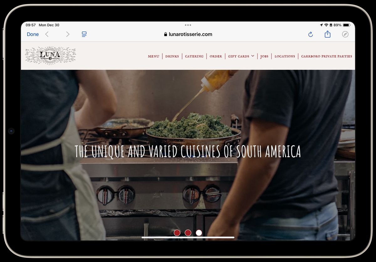 An iPad mini Screen showing a web page containing the website of a restaurant, Luna