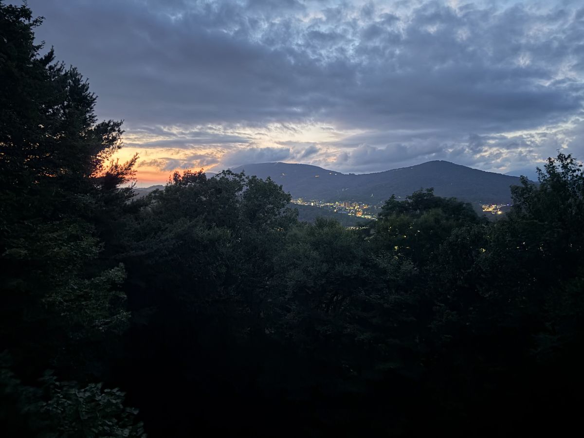 Mountains and town lights at dusk