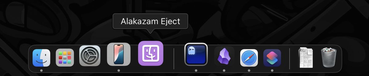 A macOS dock with a purple finder icon selected