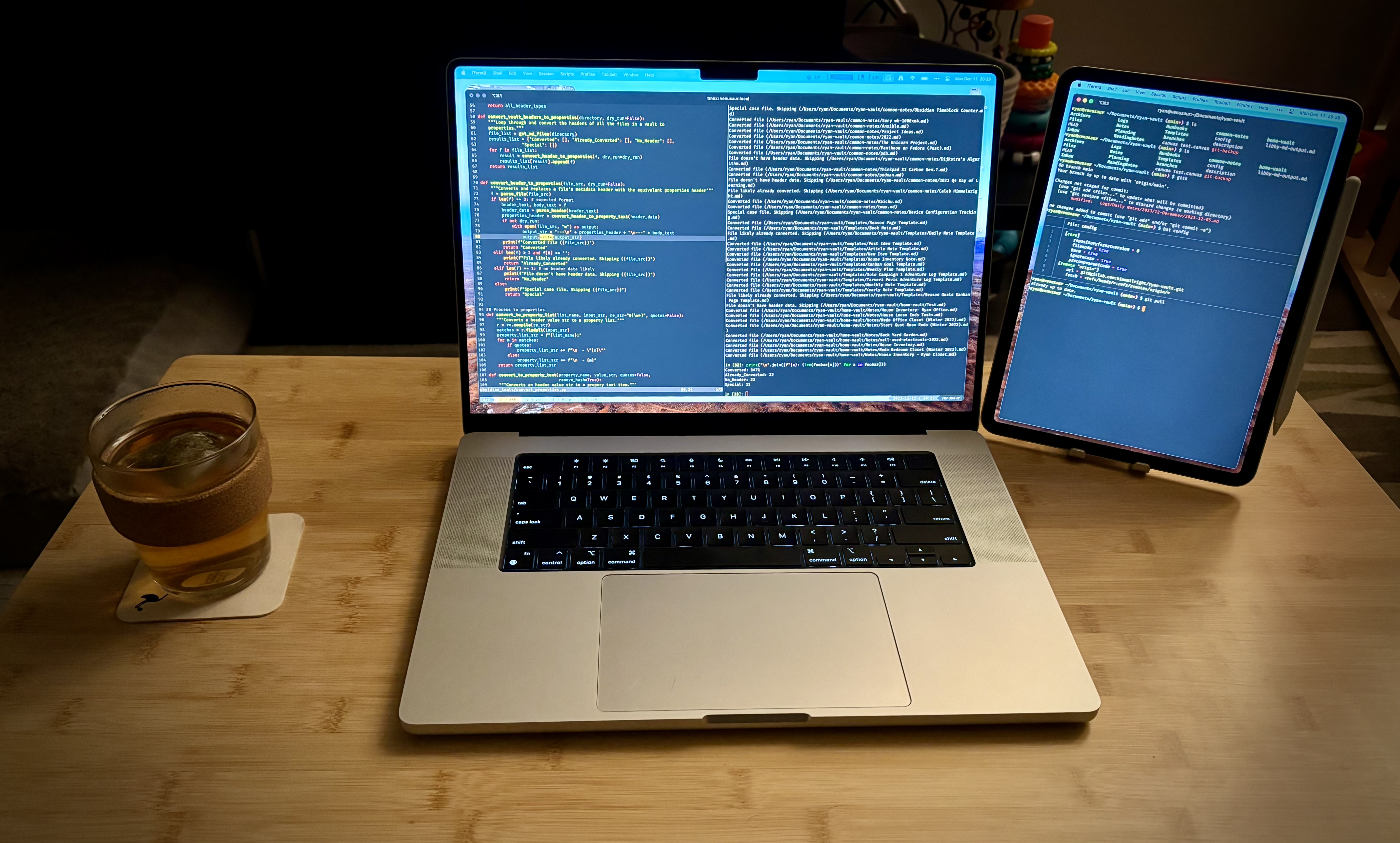 16\" M3 MBP setup on table with 11\" portrait iPad Pro next to it