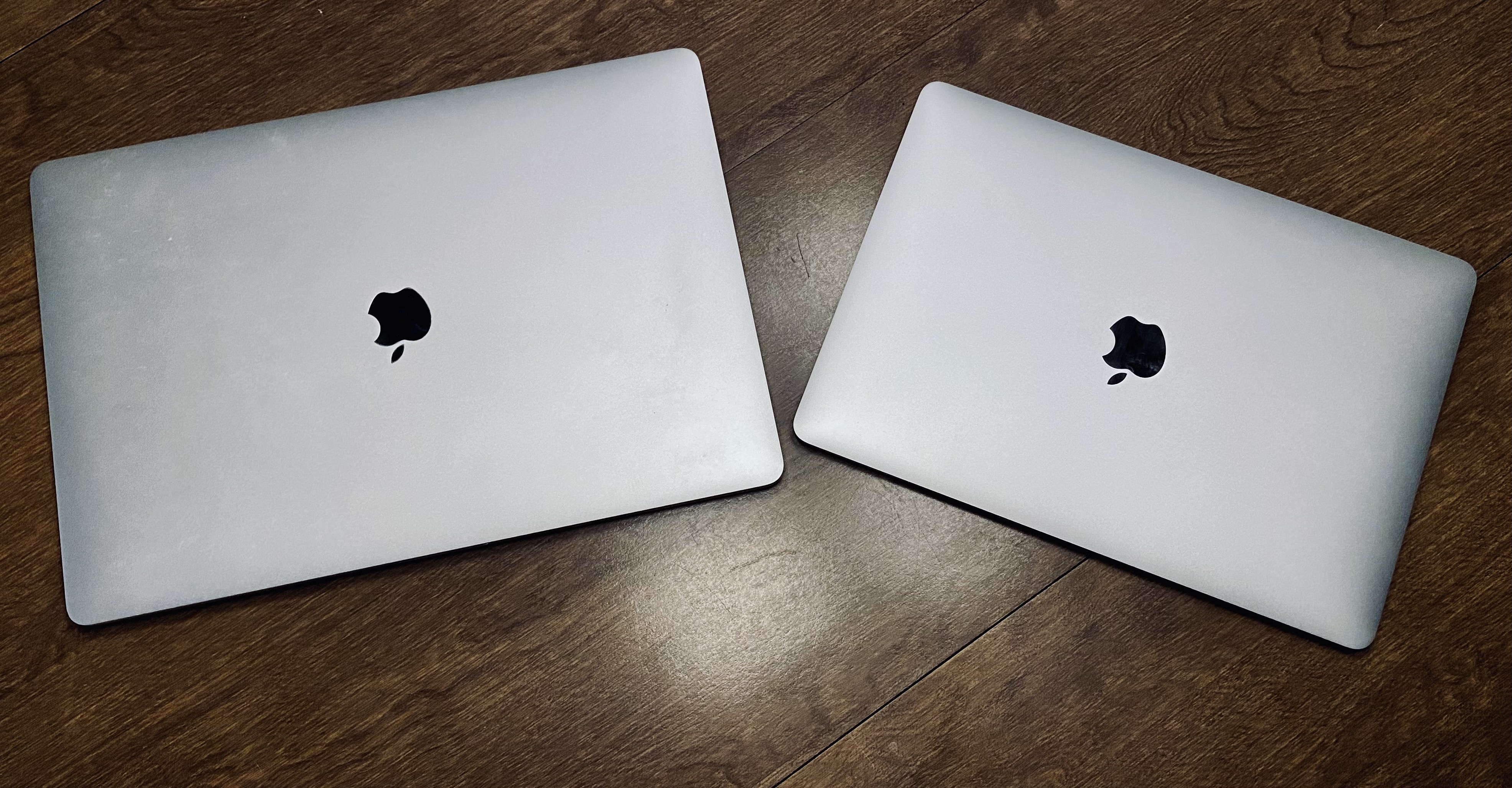 Both Macs, closed on table
