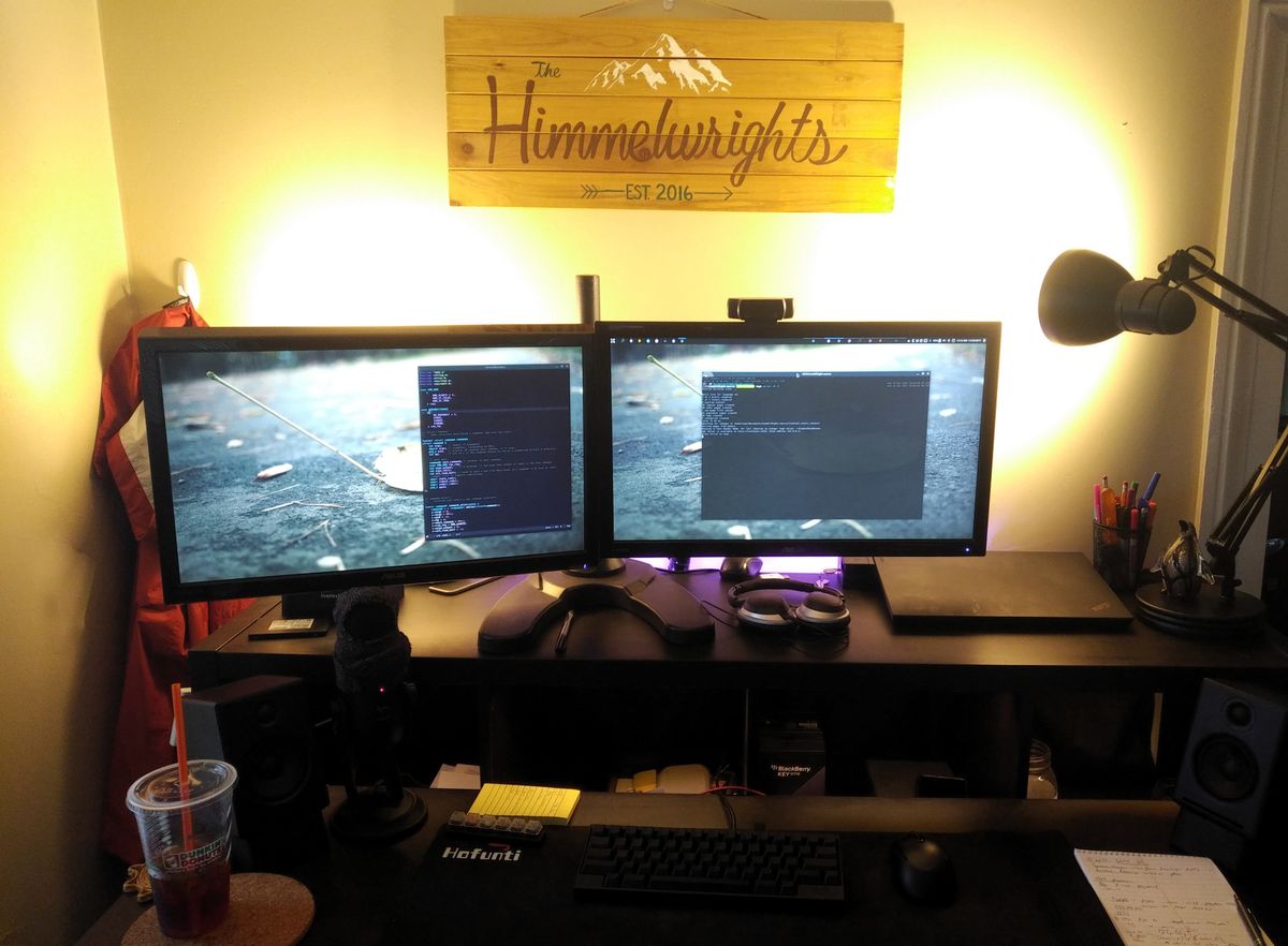 A front on picture of a two monitor desk setup