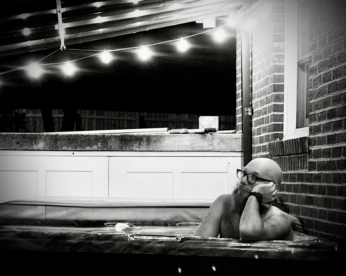 Me in a hot tub under lights